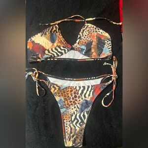 Two-piece swimsuit brand new never wore due to being too small